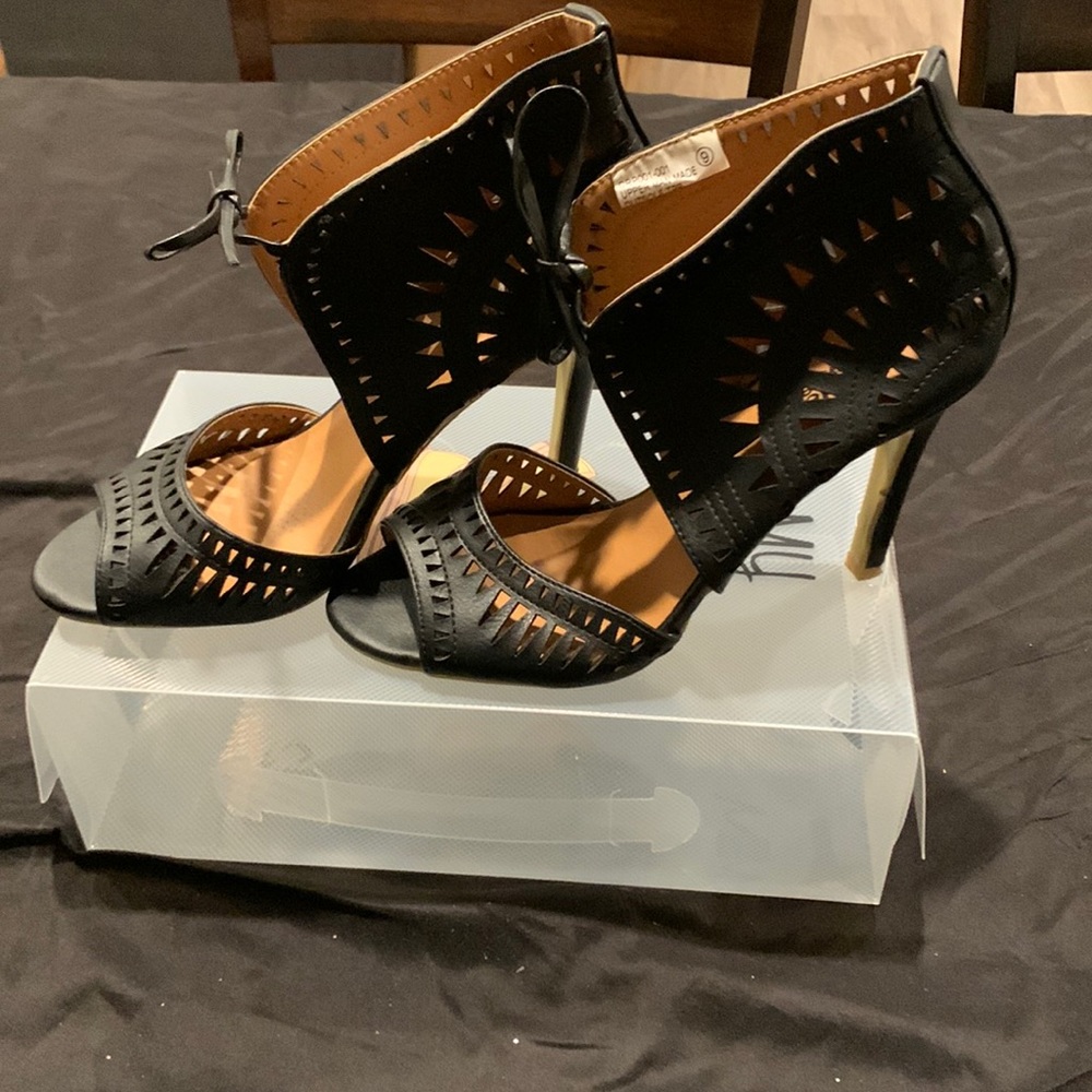 A Charlotte Russe design. Black. Size 9